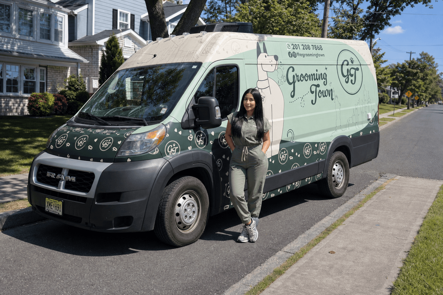 The Grooming Town van at the curb of a suburban home