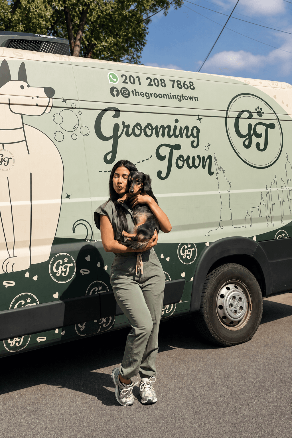 The branded Grooming Town mobile spa van with Solmary alongside